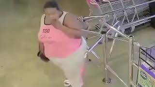 Black lady steals 100 bottles at the liquor store