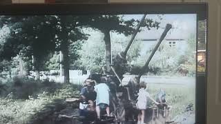 After Hitler, kids playing on anti-aircraft gun