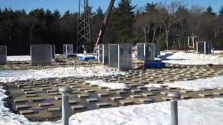 Pallets of Panels on Roof Awaiting Intallation