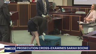 Sarah Boone closes suitcase in front of jury