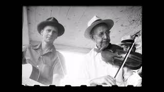 Uncle Charlie Higgins fiddles Birdie