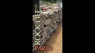 Dry stone wall building continued 2 of 3.