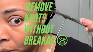 Remove knots safely after protective styles with (Wild Growth Hair Oil)