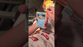 ￼ Opening Pokémon packs