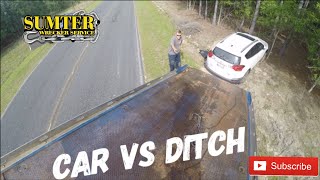 Car vs Ditch