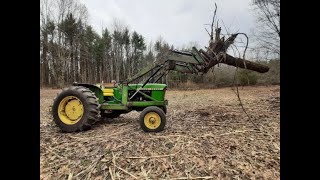 How to use a bead breaker to change a tractor tire.