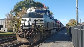 Norfolk Southern and Kansas City Southern lead a tanker train through Nappanee Indiana