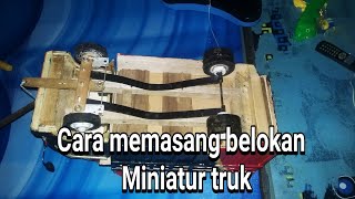 cara memasang belokan dan per daun miniatur truk oleng