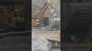 cat excavator and dumper 775e