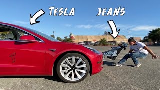 PULLING A TESLA WITH MY TEETH!!