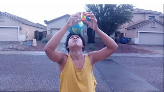 Rubik's Cube Solving While Balancing Ball on Head