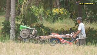 traktor sawah g 600 membajak lahan berumput lebat bekas padi