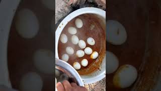 Placing Eggs to make Special Egg Curry