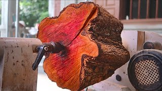 Wood turning // The process of turning a piece of rough wood, display piece,