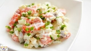 Salad with a salmon and quail eggs