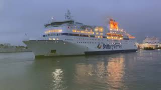 Normandie, Brittany Ferries ship docking in reverse at nighttime in Portsmouth