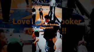 Devin booker signs autographs