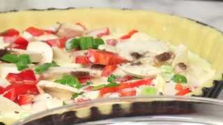 Cooking a fresh vegetable Quiche