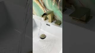 Gold waterfall faucet with pop-up drain