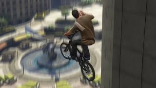 bogg dann gets a phone call while doing a BMX trick