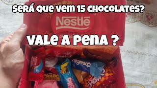 abir uma caixa de chocolate NESTLÉ será que vem mesmo 15 chocolates