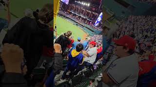 Texas Rangers Fans storm the field at watch party night of game 5 World Series win Part 1