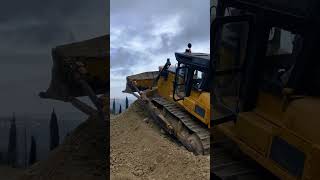 Skilled Komatsu D155 operator.