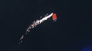 The Thunderstorm Skydivers into Mile High Stadium