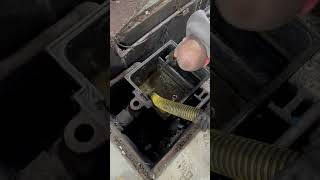 Vac Truck Sucking Out the Contents of an Oil Water Seperator