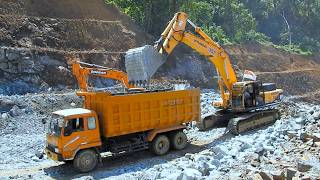 Hill Road Construction - Excavators Trucks Digging Excavating Rock And Dirt