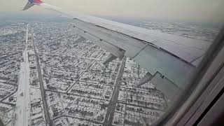 Flying into Midway airport. Snowy Chicago day.