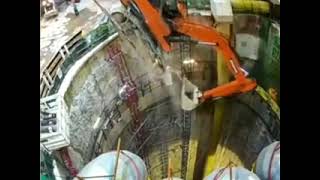 Excavator falls through the shaft due to crane failure in Hong Kong