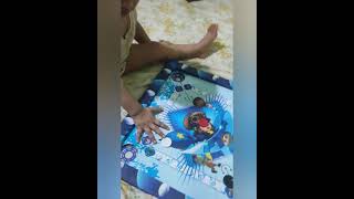 Cute Baby Playing Carrom