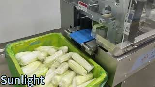 Packing corns. #vegetablepackingmachine