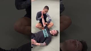 What does “take the slack off” mean in armbar situation?