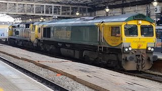 Double-headed Class 66 and 70 power through Huddersfield Station