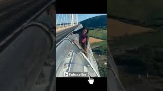 bridge of jump skating and parachute Stunt