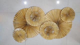 Gold DIY paper pinwheel craft for wall decoration