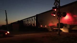 CSX ES44AC leads interesting consist east through New Hartford