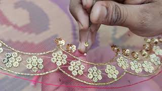 making of golden sequins flower with pearl in middle