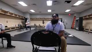 Cain Velasquez in lockroom celebrating DC BELT