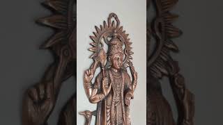 Murugan antique looking metal wall hanging.