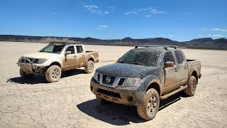 Nissan frontiers playing in the mud