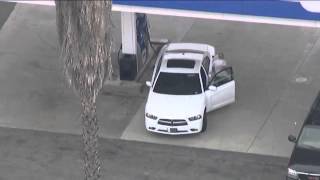 Police Chase at Gas Station EPIC FAIL