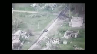 Ukraine - A Russian tank is destroyed at a crossroads by Ukrainian troops. Combat footage