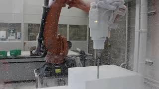 Robot machining a polystyrene block for creative modelling