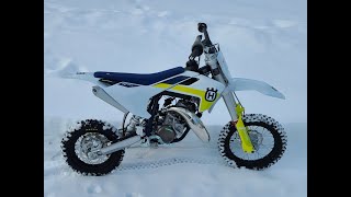 Eli testing out his new bike in the snow.