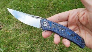 Custom Quantum by Sergey Shirogorov. S125V smoky mirror blade. CaboTi scales.