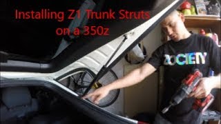 Installing  Z1 Motorsports trunk struts on the 350z!