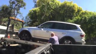 BMW X3 getting towed